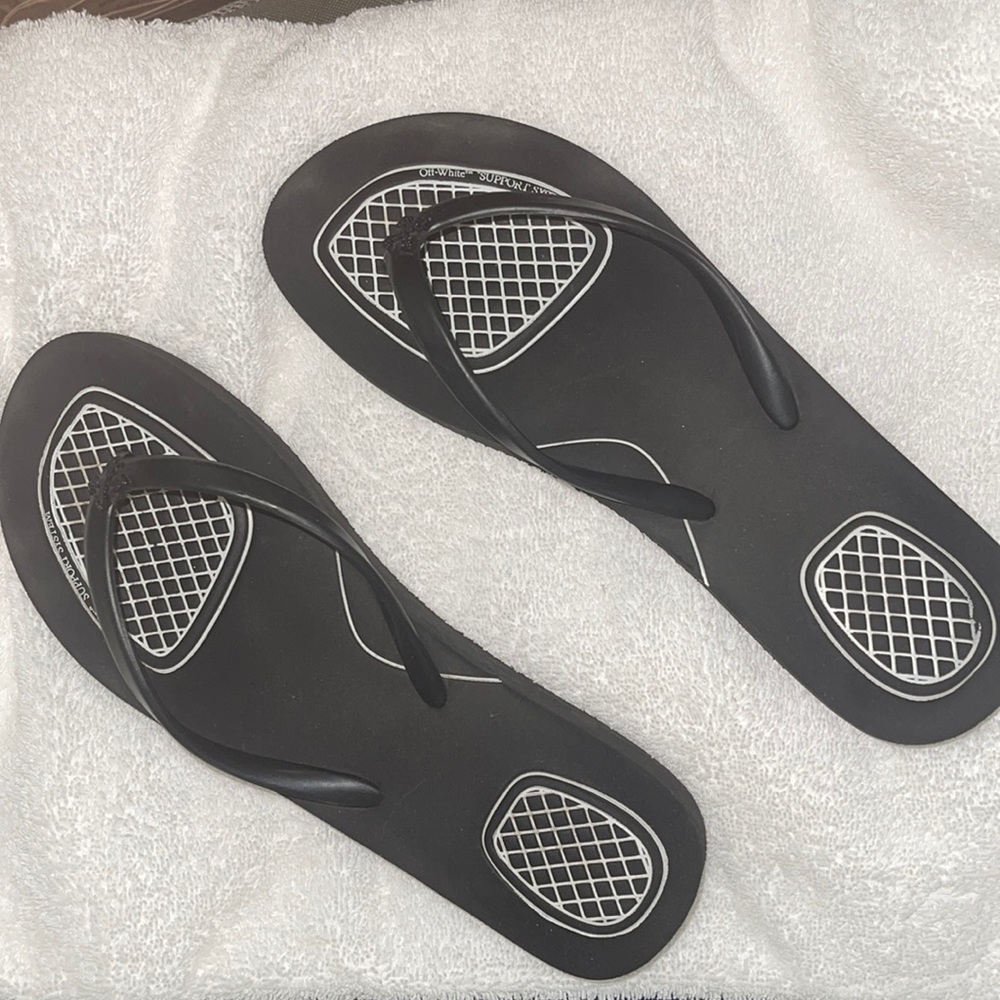 Women’s black Off-white flip flops